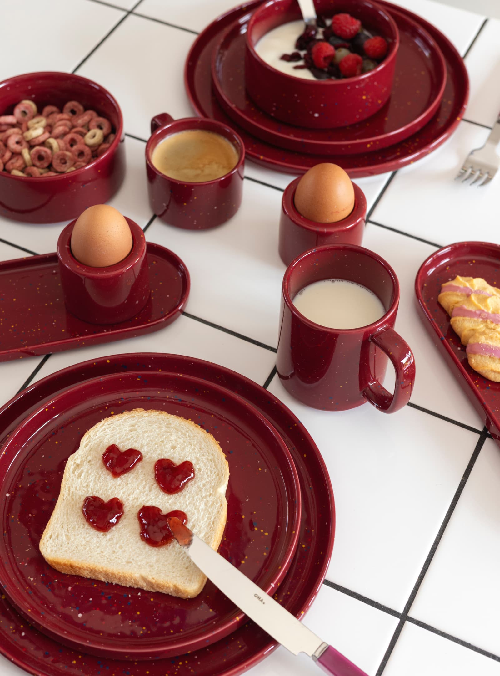 Fika Burgundy tableware on a breakfast table